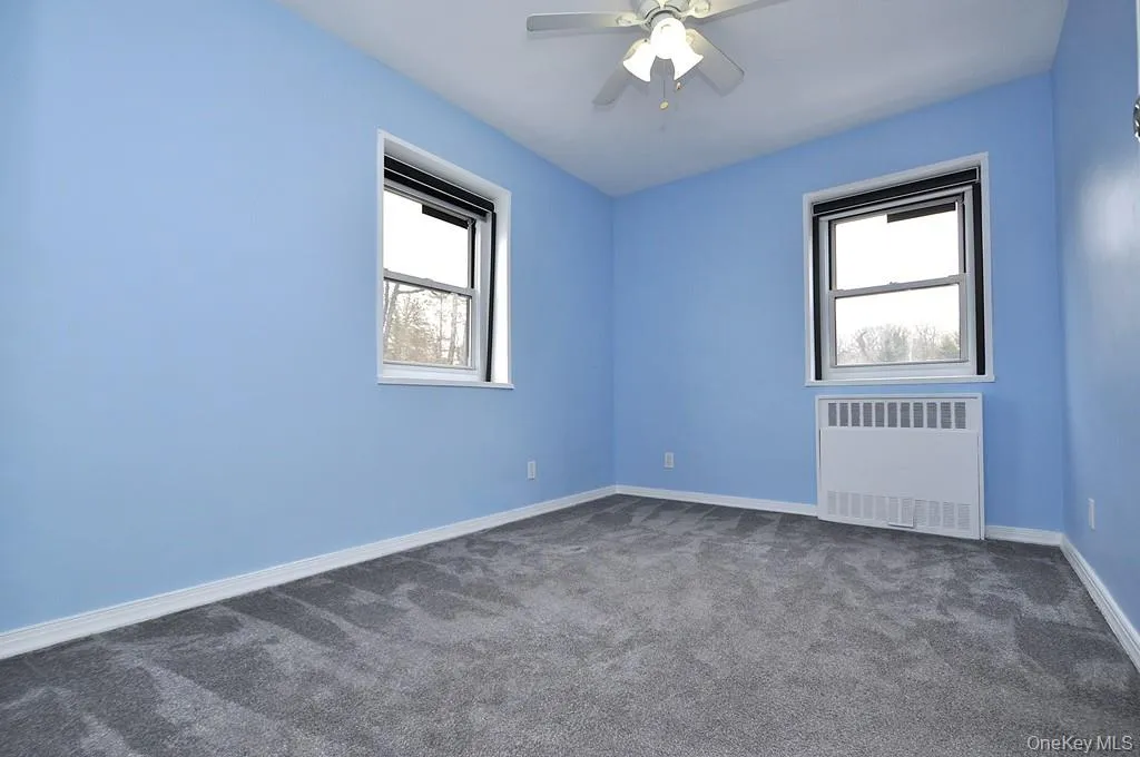 The corner second bedroom has covered hardwood floors. and can be used as a home office, den or guest room. The room is approx 11'-10' x 8'-9". The corner second bedroom has covered hardwood floors. and can be used as a home office, den or guest room. The room is approx 11'-10' x 8'-9".
