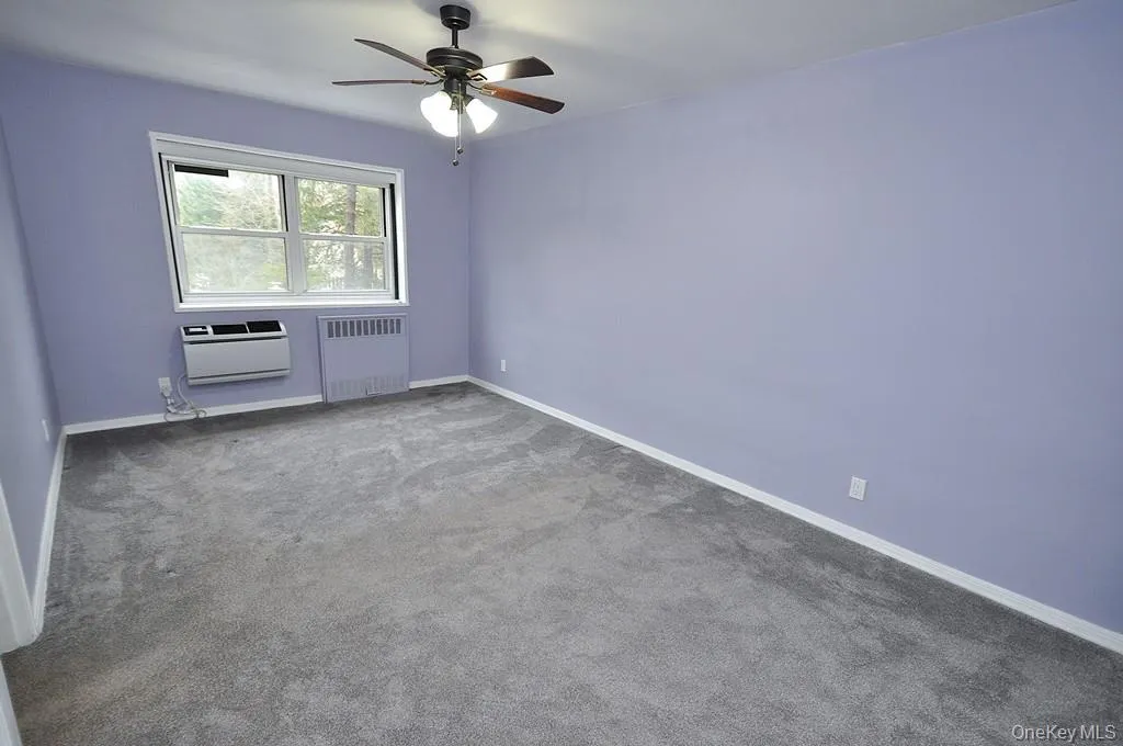 The large main bedroom is almost as large as the living room and has a wall of closets and covered refinished hardwood floors. The bedroom can easily accommodate a king size bed, dresser, night stands and reading chair. The bedroom is 16'-8" x 10'-7". The large main bedroom is almost as large as the living room and has a wall of closets and covered refinished hardwood floors. The bedroom can easily accommodate a king size bed, dresser, night stands and reading chair. The bedroom is 16'-8" x 10'-7".