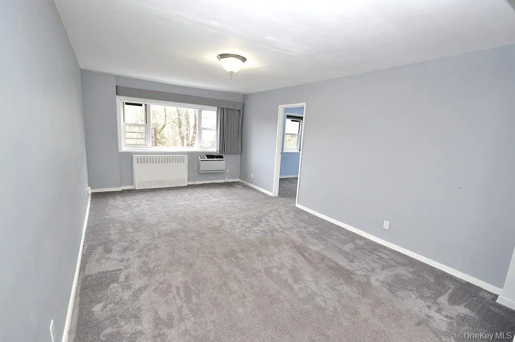 Large Living room can accommodate both a dining area and entertaining area. There are beautiful refinished covered floors. The room is approx 19'-6" x 11'-7" Large Living room can accommodate both a dining area and entertaining area. There are beautiful refinished covered floors. The room is approx 19'-6" x 11'-7"