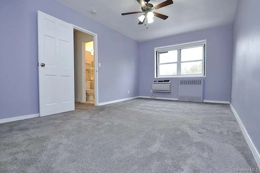 The large main bedroom is almost as large as the living room and has a wall of closets and covered refinished hardwood floors. The bedroom can easily accommodate a king size bed, dresser, night stands and reading chair. The bedroom is 16'-8" x 10'-7". The large main bedroom is almost as large as the living room and has a wall of closets and covered refinished hardwood floors. The bedroom can easily accommodate a king size bed, dresser, night stands and reading chair. The bedroom is 16'-8" x 10'-7".
