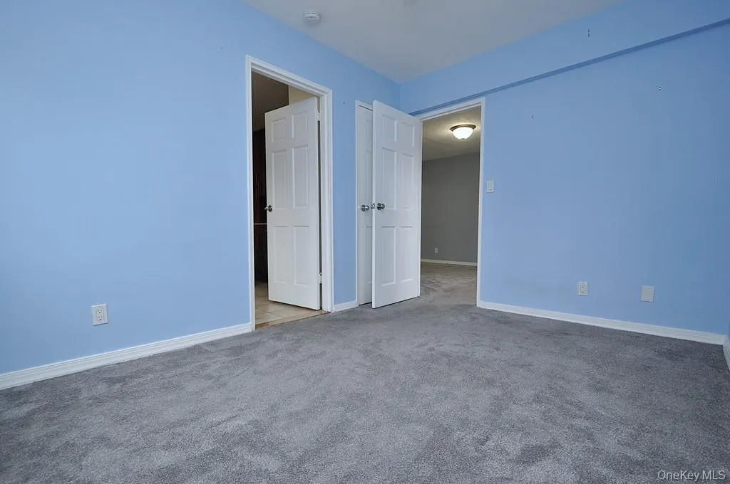 The corner second bedroom has covered hardwood floors. and can be used as a home office, den or guest room. The room is approx 11'-10' x 8'-9". The corner second bedroom has covered hardwood floors. and can be used as a home office, den or guest room. The room is approx 11'-10' x 8'-9".