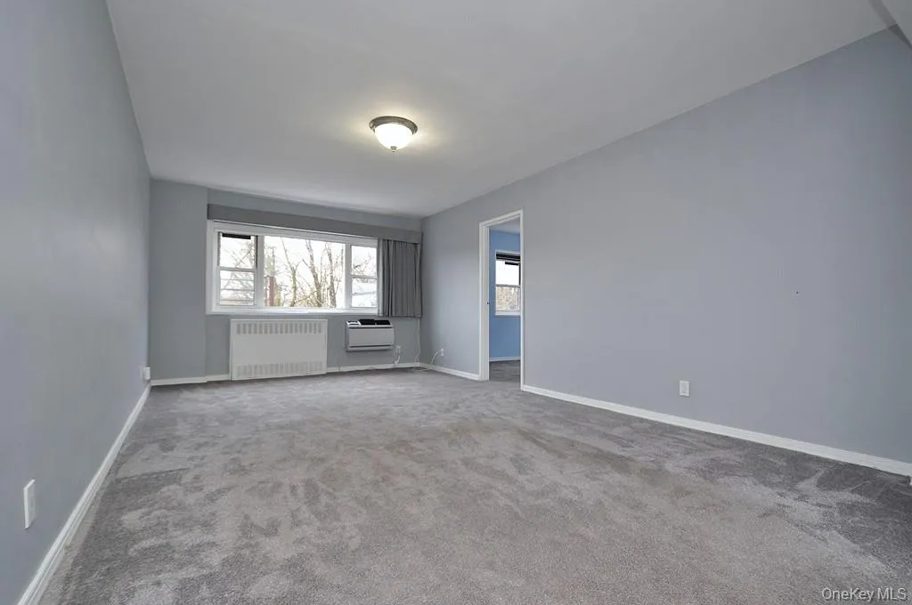 Large Living room can accommodate both a dining area and entertaining area. There are beautiful refinished covered floors. The room is approx 19'-6" x 11'-7" Large Living room can accommodate both a dining area and entertaining area. There are beautiful refinished covered floors. The room is approx 19'-6" x 11'-7"
