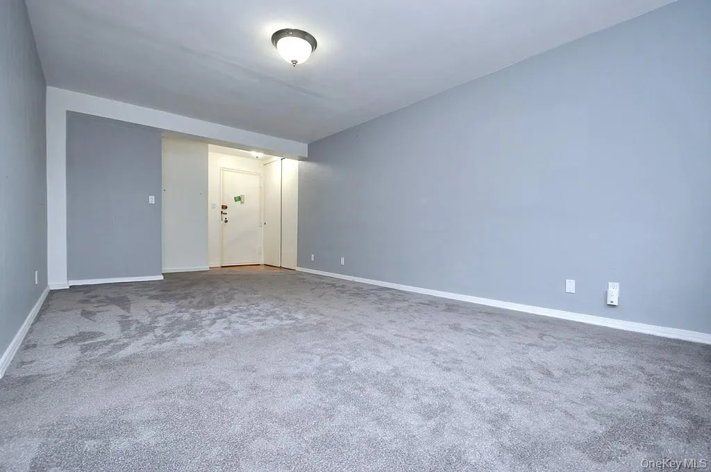 Large Living room can accommodate both a dining area and entertaining area. There are beautiful refinished covered floors. The room is approx 19'-6" x 11'-7" Large Living room can accommodate both a dining area and entertaining area. There are beautiful refinished covered floors. The room is approx 19'-6" x 11'-7"