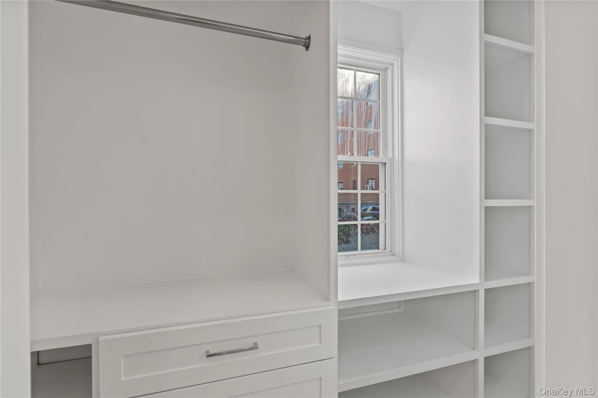 Primary bedroom closet. Primary bedroom closet.