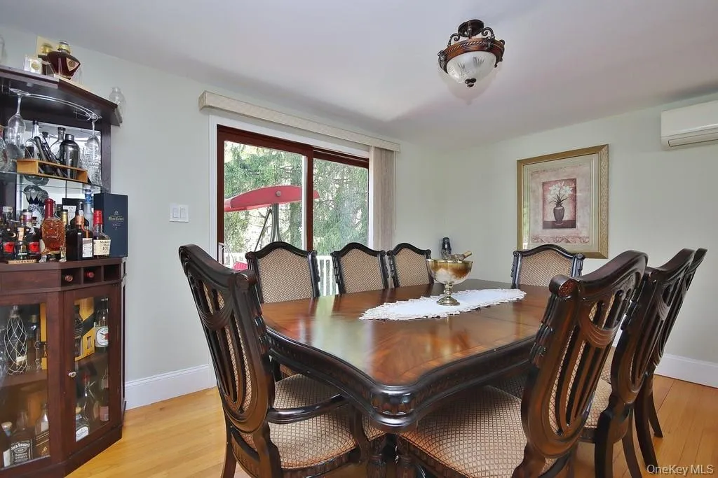 Dining Room has ductless AC and SGD to deck Dining Room has ductless AC and SGD to deck