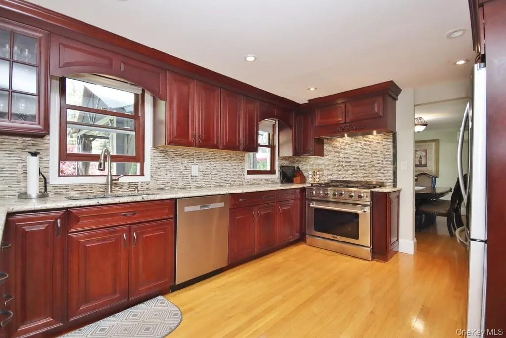 Updated Kitchen has cherry cabinetry Updated Kitchen has cherry cabinetry