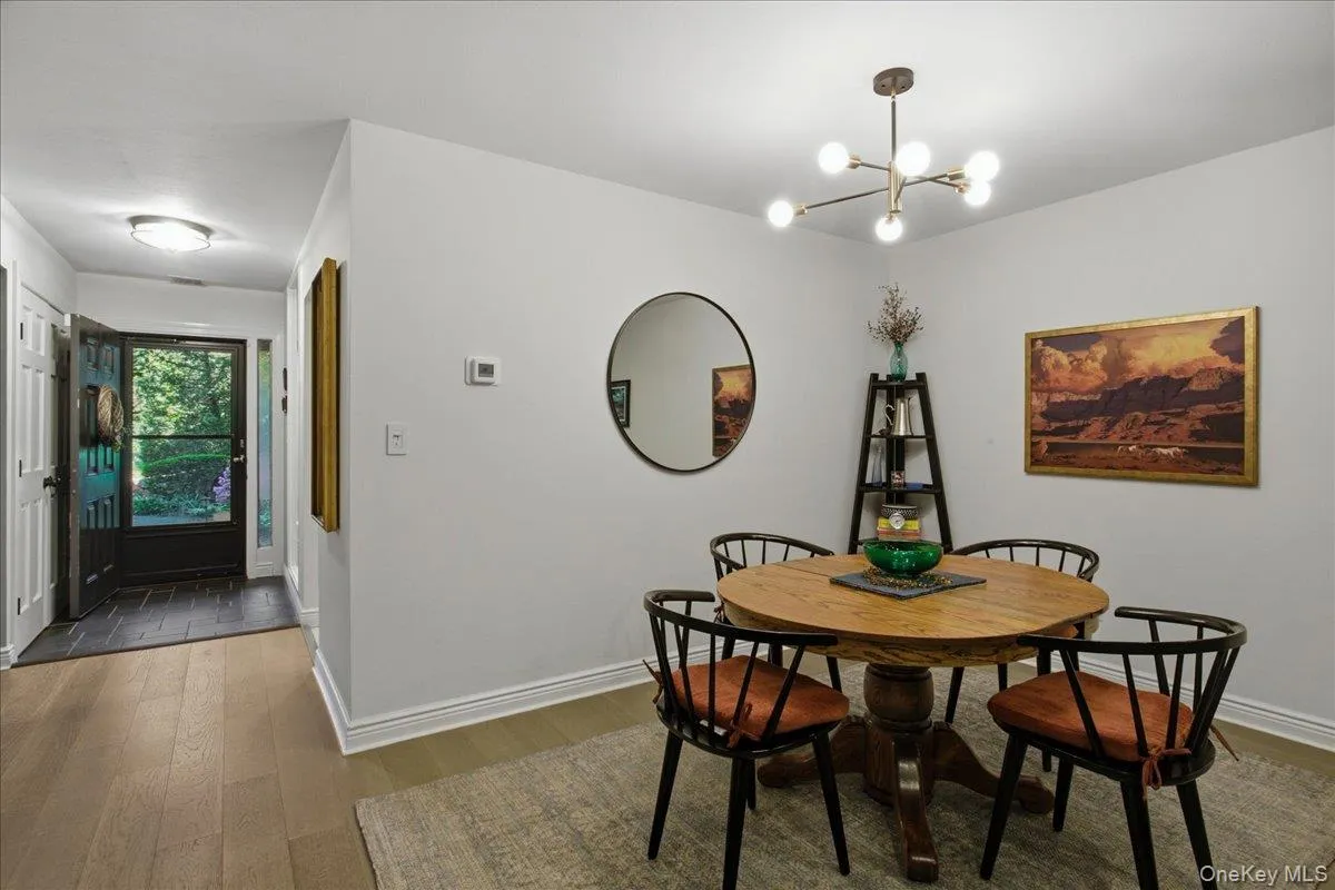 Adjacent to the kitchen is the dining area. Adjacent to the kitchen is the dining area.