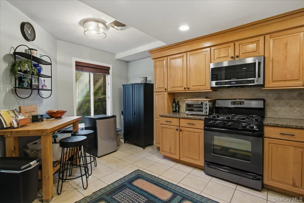 View of the large eat in kitchen. View of the large eat in kitchen.
