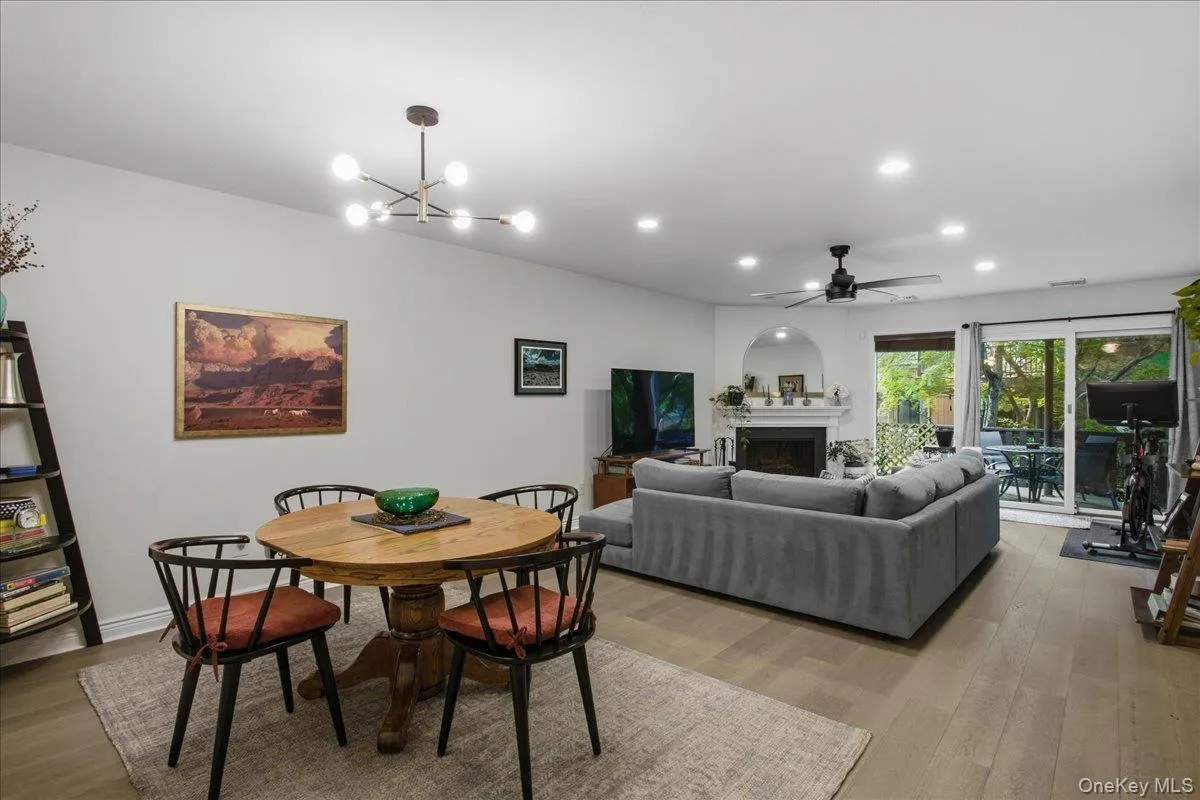 The large living room offers a fireplace for cozy winter nights and double sliding doors leading onto your own large patio. The large living room offers a fireplace for cozy winter nights and double sliding doors leading onto your own large patio.