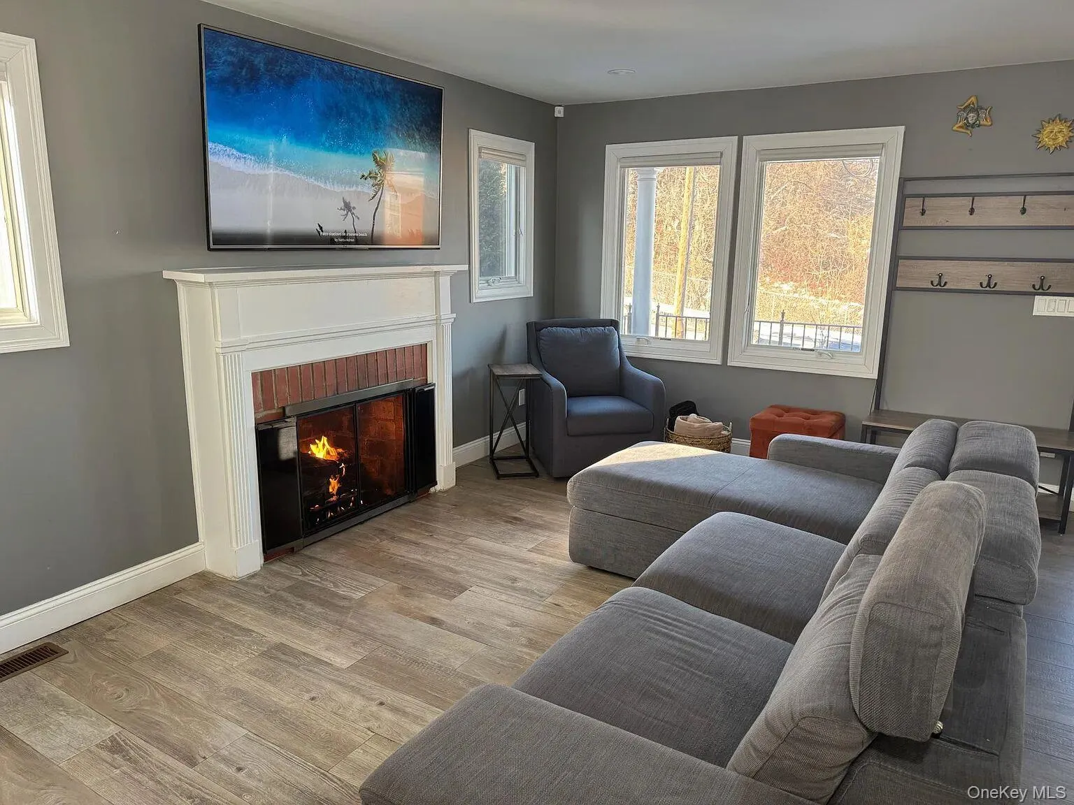 Living room with gas fireplace. View from Kitchen Living room with gas fireplace. View from Kitchen