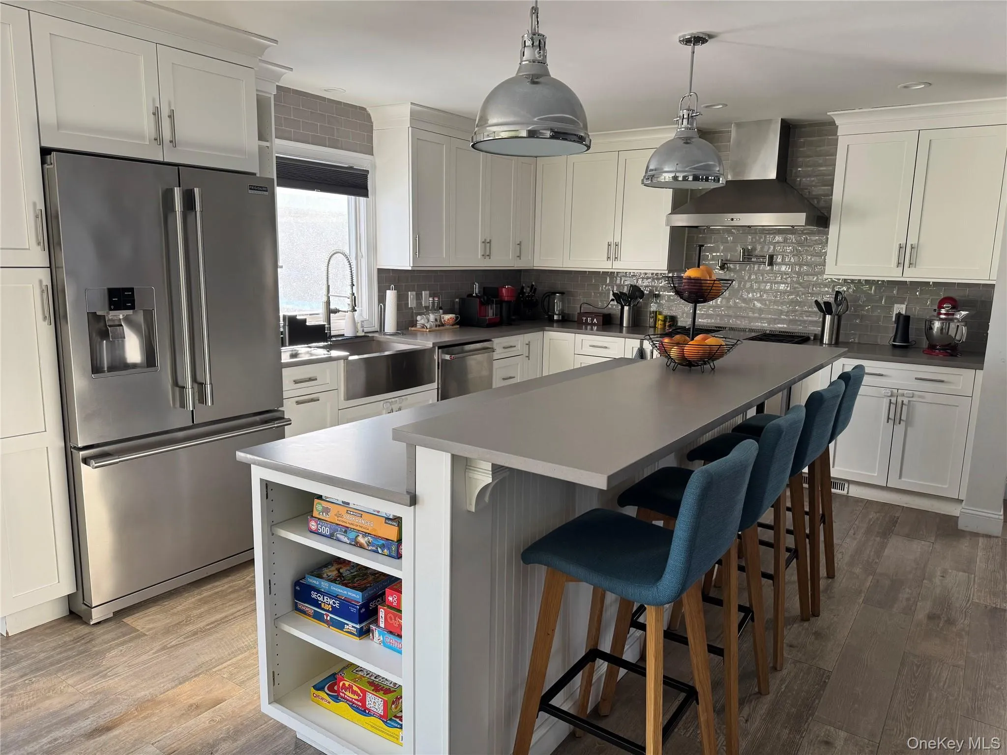 Kitchen featuring island, stainless steel appliances Kitchen featuring island, stainless steel appliances