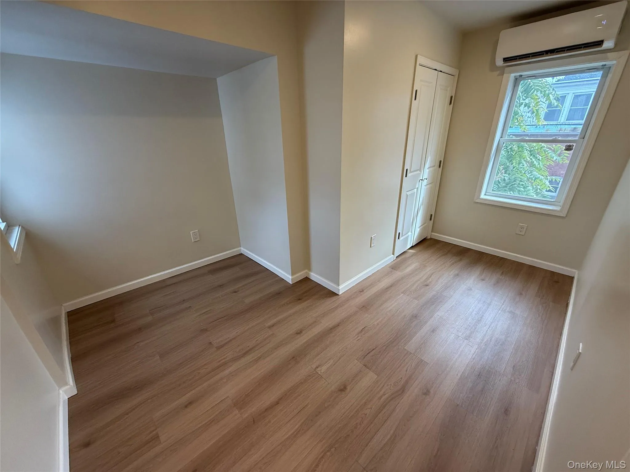 Unfurnished bedroom with light wood-type flooring Unfurnished bedroom with light wood-type flooring