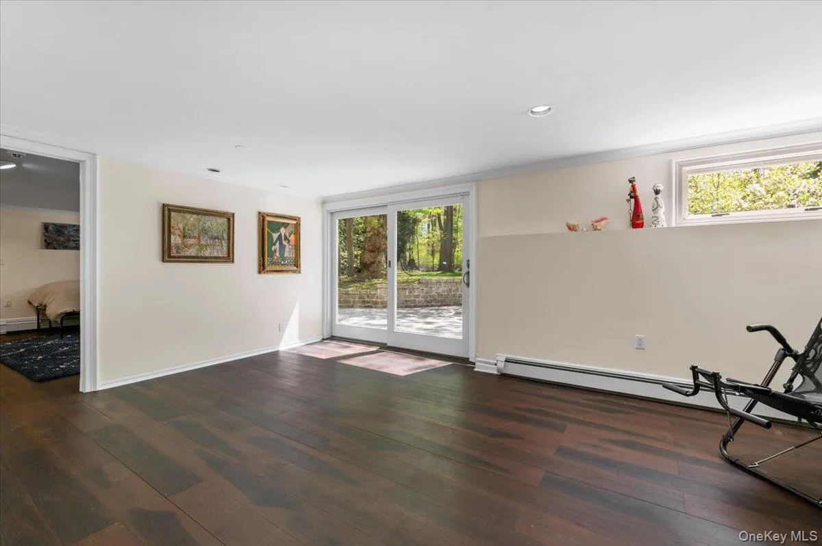 Lower Level with glass doors to patio and pool Lower Level with glass doors to patio and pool