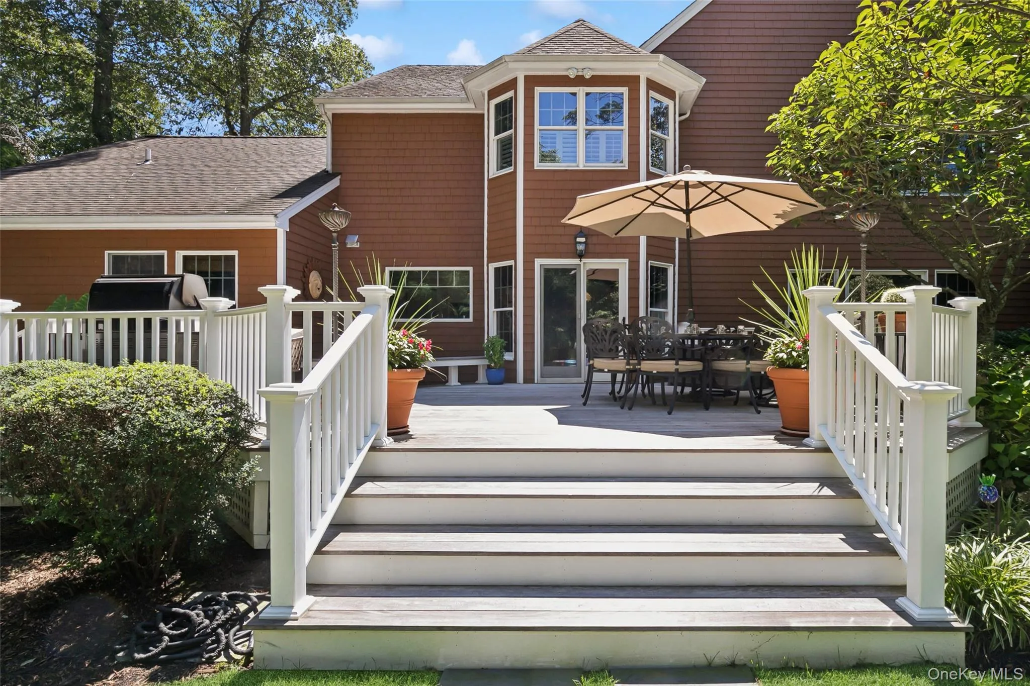 Beautiful IPE decking leads to the lush parklike acre Beautiful IPE decking leads to the lush parklike acre