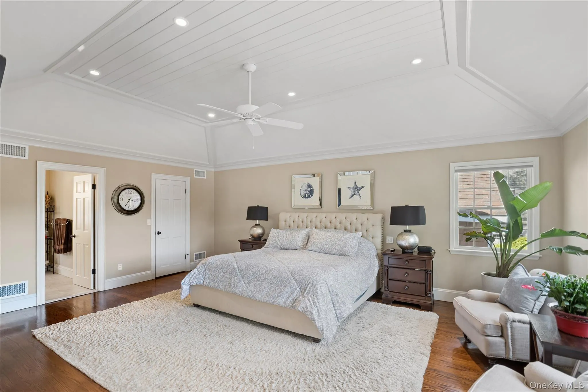 Primary Bedroom architectural Tray ceiling -2 walk in closets and spa retreat full bath Primary Bedroom architectural Tray ceiling -2 walk in closets and spa retreat full bath