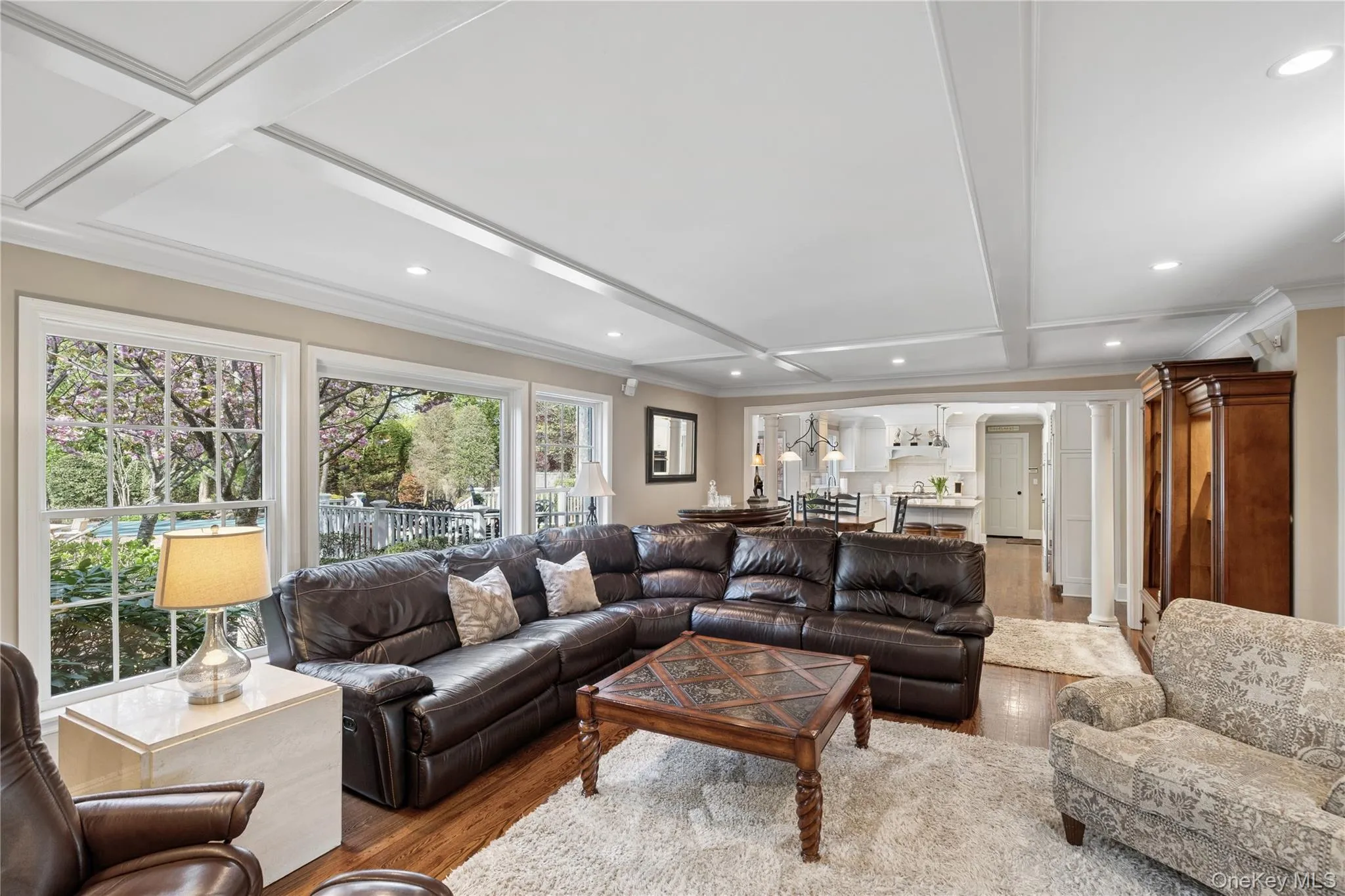 Den, GAS Fireplace, granite hearth and accent molding above fireplace. Picturesque windows Den, GAS Fireplace, granite hearth and accent molding above fireplace. Picturesque windows