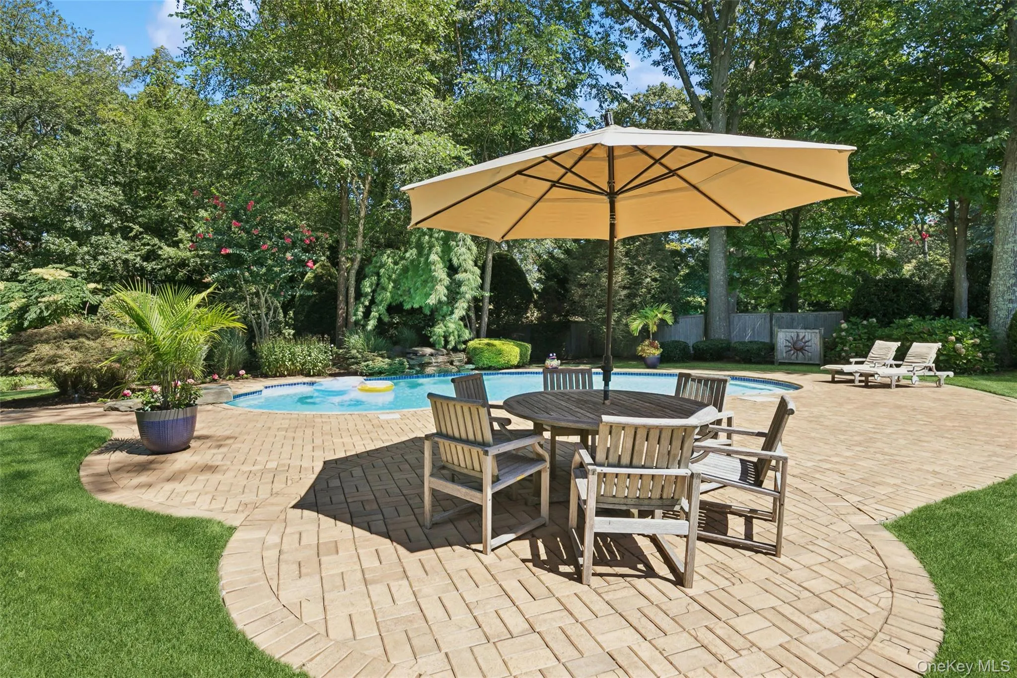 Professionally landscaped yard gives a tropical feel for relaxing Professionally landscaped yard gives a tropical feel for relaxing