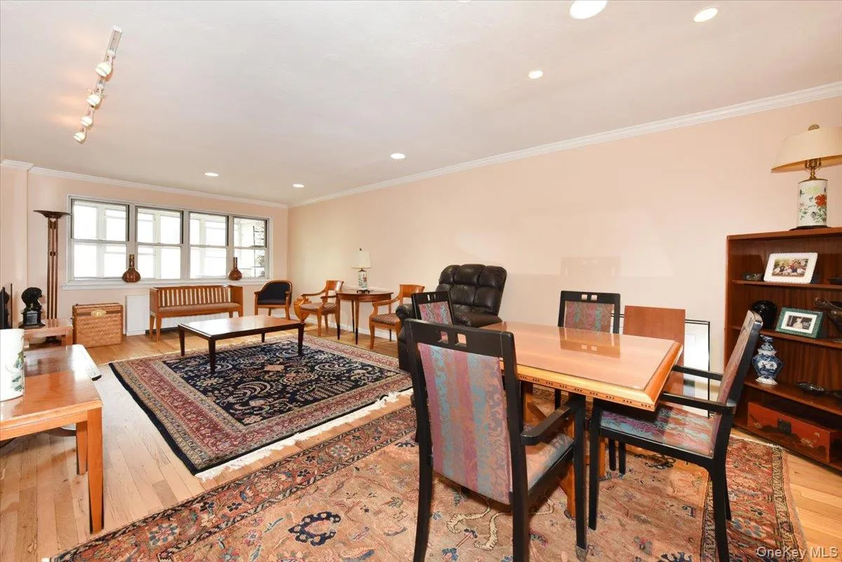 Living/Dining Room with Screen Porch Living/Dining Room with Screen Porch