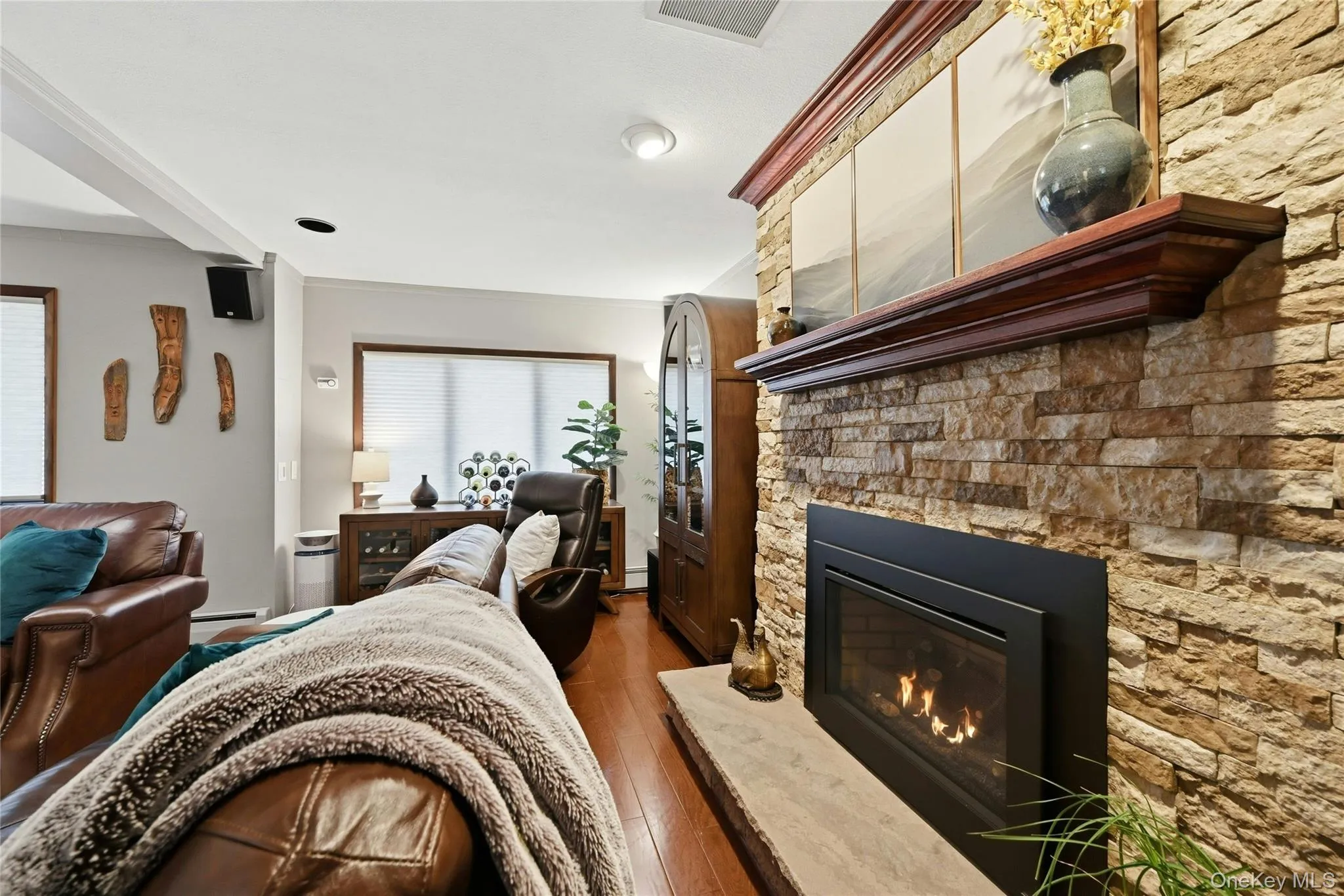 The Stunning Stone Wall & Gas Fireplace In The Large Family Room/Den. The Stunning Stone Wall & Gas Fireplace In The Large Family Room/Den.
