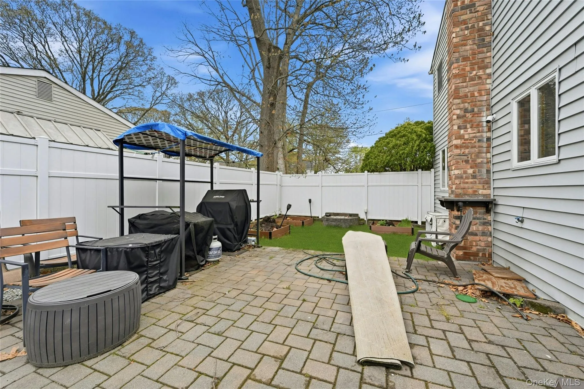 The Fully Fenced (PVC Fencing) Backyard Offers Ample Room For Entertaining & A Large Brick/Paver Patio. The Fully Fenced (PVC Fencing) Backyard Offers Ample Room For Entertaining & A Large Brick/Paver Patio.