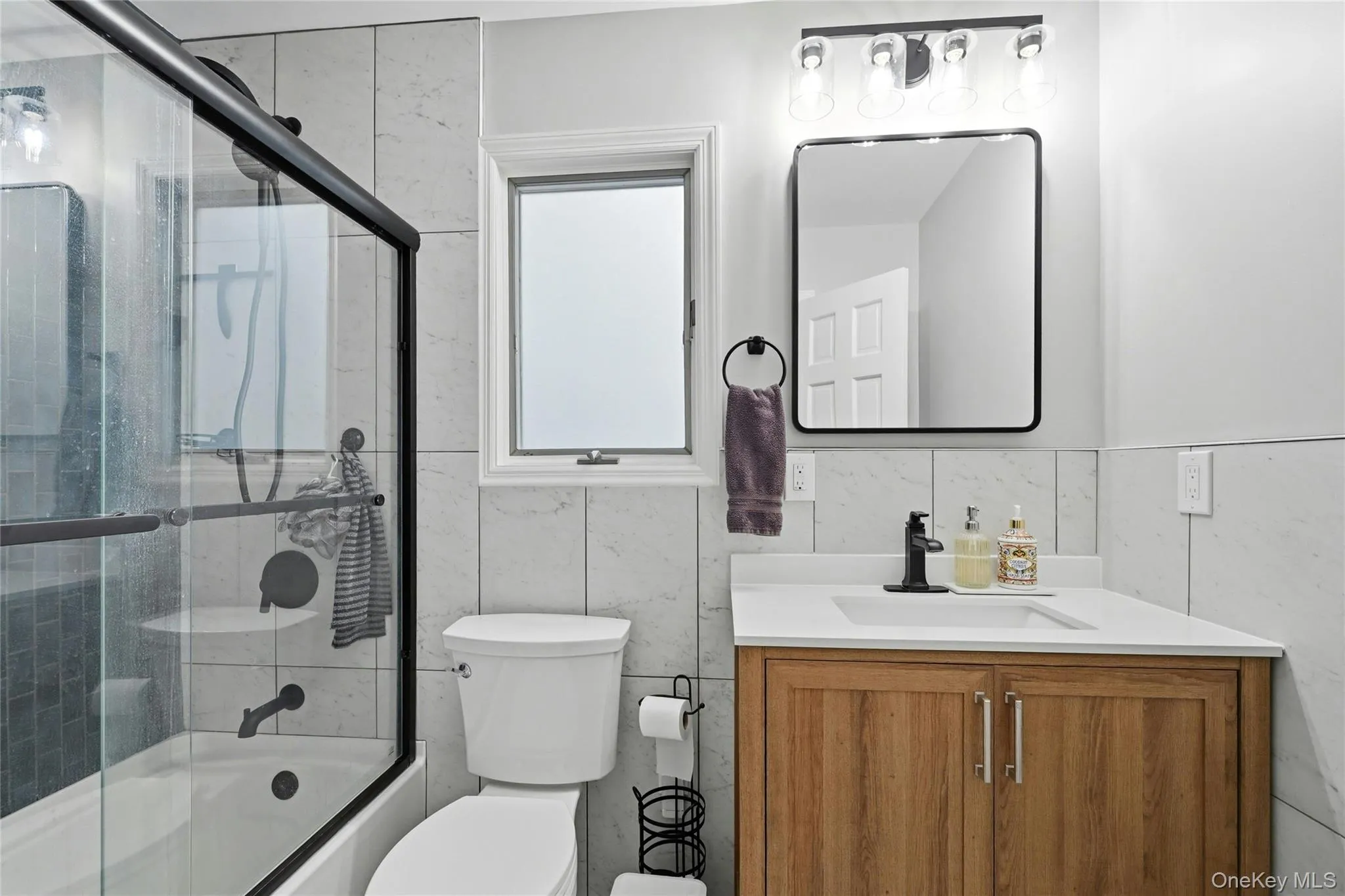 The One Year Old Stunning Second Floor Bathroom Offers A Full Bathtub/Shower With All Beautifully Ceramic Tiled Walls & Accent Blue Ceramic Tiled Wall, All Ceramic Tiled Walls Throughout The Bathroom, Ceramic Tiled Floors & An Upgraded Vanity And Fixtures. The One Year Old Stunning Second Floor Bathroom Offers A Full Bathtub/Shower With All Beautifully Ceramic Tiled Walls & Accent Blue Ceramic Tiled Wall, All Ceramic Tiled Walls Throughout The Bathroom, Ceramic Tiled Floors & An Upgraded Vanity And Fixtures.