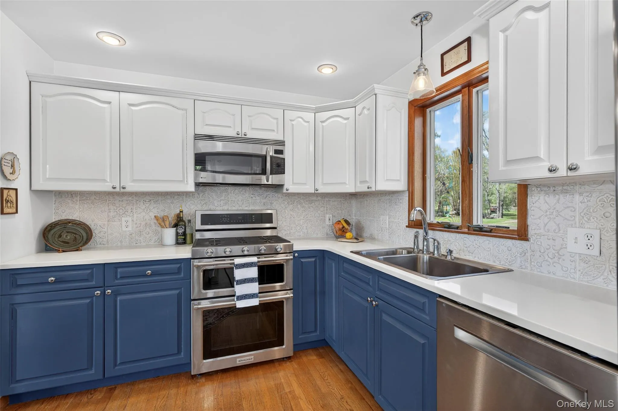 Enjoy premium SS appliances, quartz countertops and a casement window over the sink Enjoy premium SS appliances, quartz countertops and a casement window over the sink