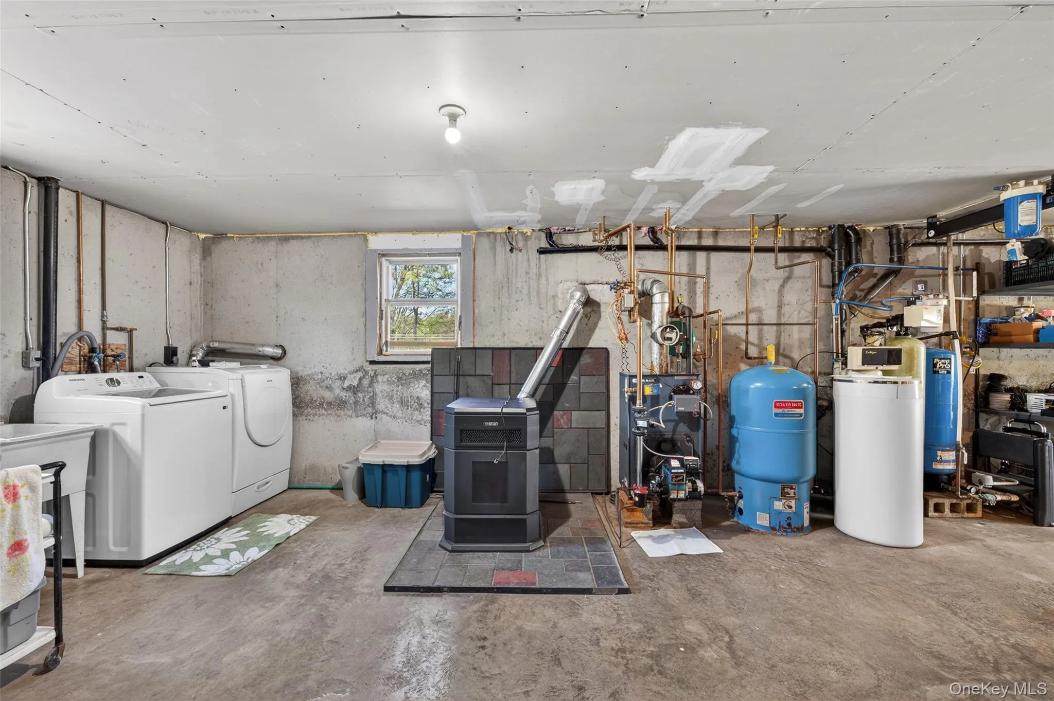 The central pellet stove is a wonderful way to supplement the heat in the house. All mechanicals have been impeccably maintained The central pellet stove is a wonderful way to supplement the heat in the house. All mechanicals have been impeccably maintained