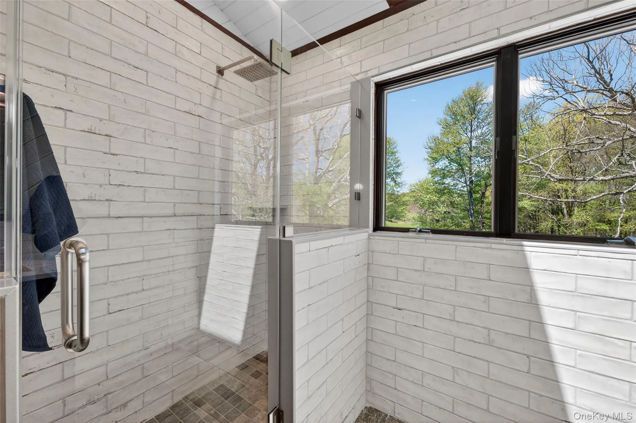 Enjoy a luxurious shower in the oversized stall with glass surround and a rainfall showerhead Enjoy a luxurious shower in the oversized stall with glass surround and a rainfall showerhead