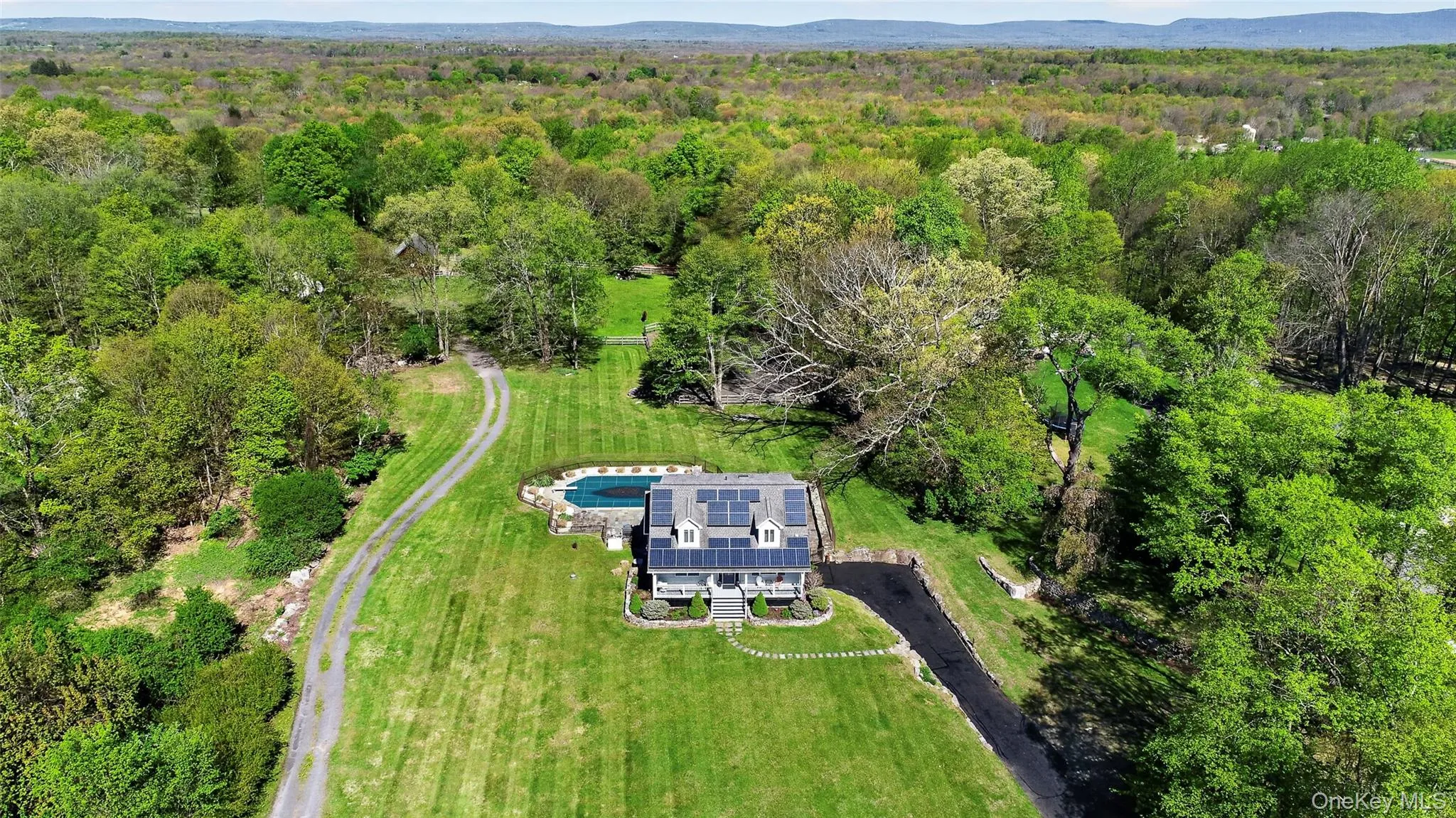 The barn is on a separate lot with a 2nd driveway for convenience. The barn is on a separate lot with a 2nd driveway for convenience.
