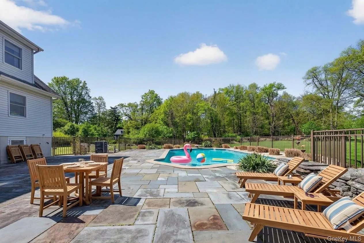 Summer fun starts here on the spacious bluestone patio. Virtually Staged Summer fun starts here on the spacious bluestone patio. Virtually Staged