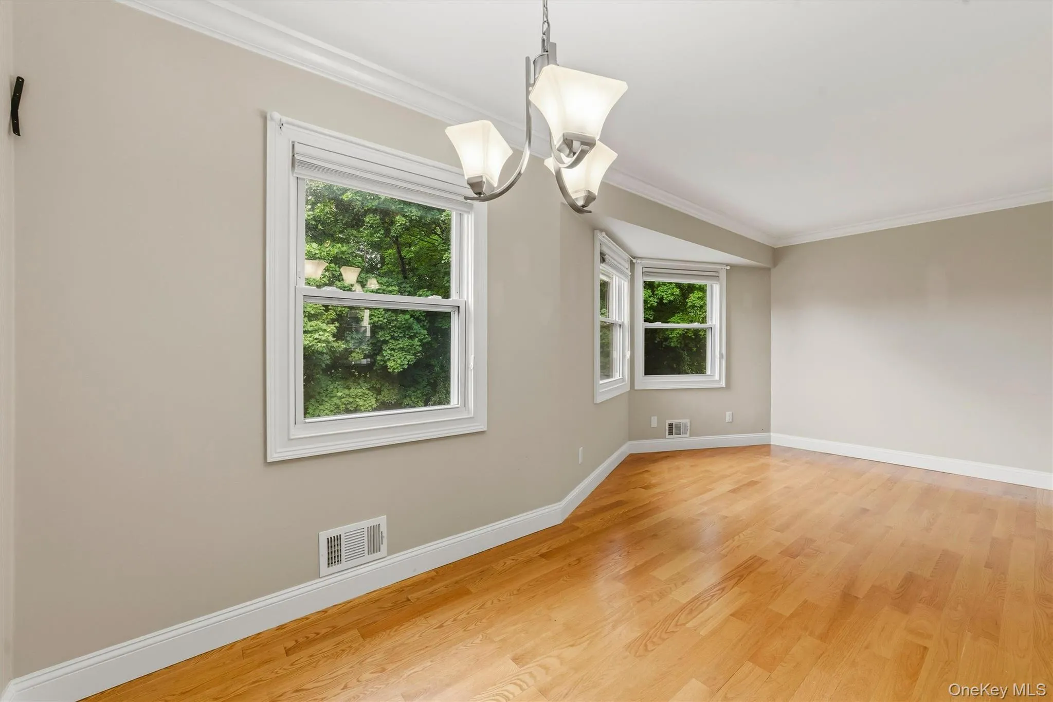 Open floor plan between dining and living room Open floor plan between dining and living room