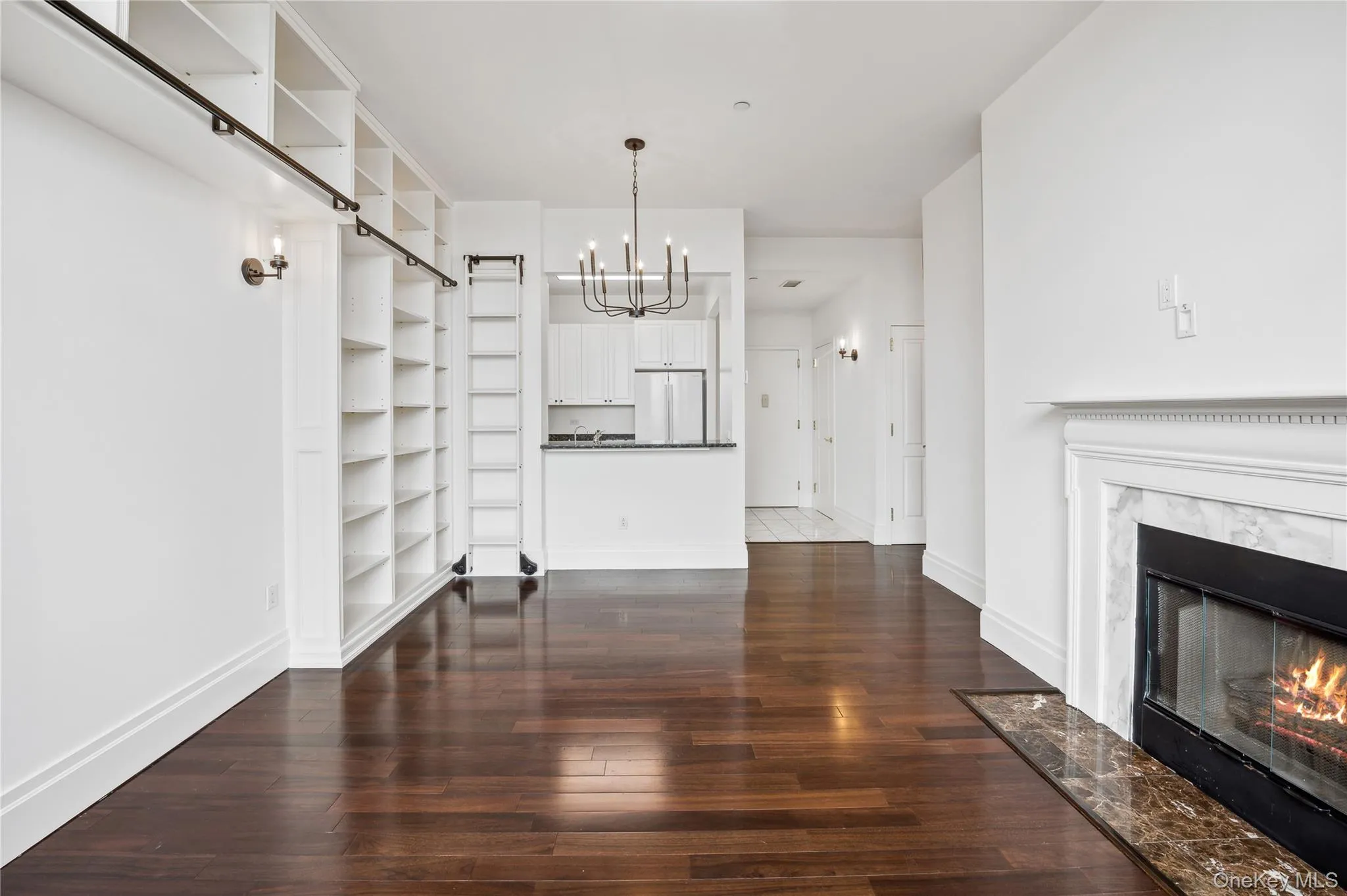 Living room with custom built-in bookshelves. Living room with custom built-in bookshelves.