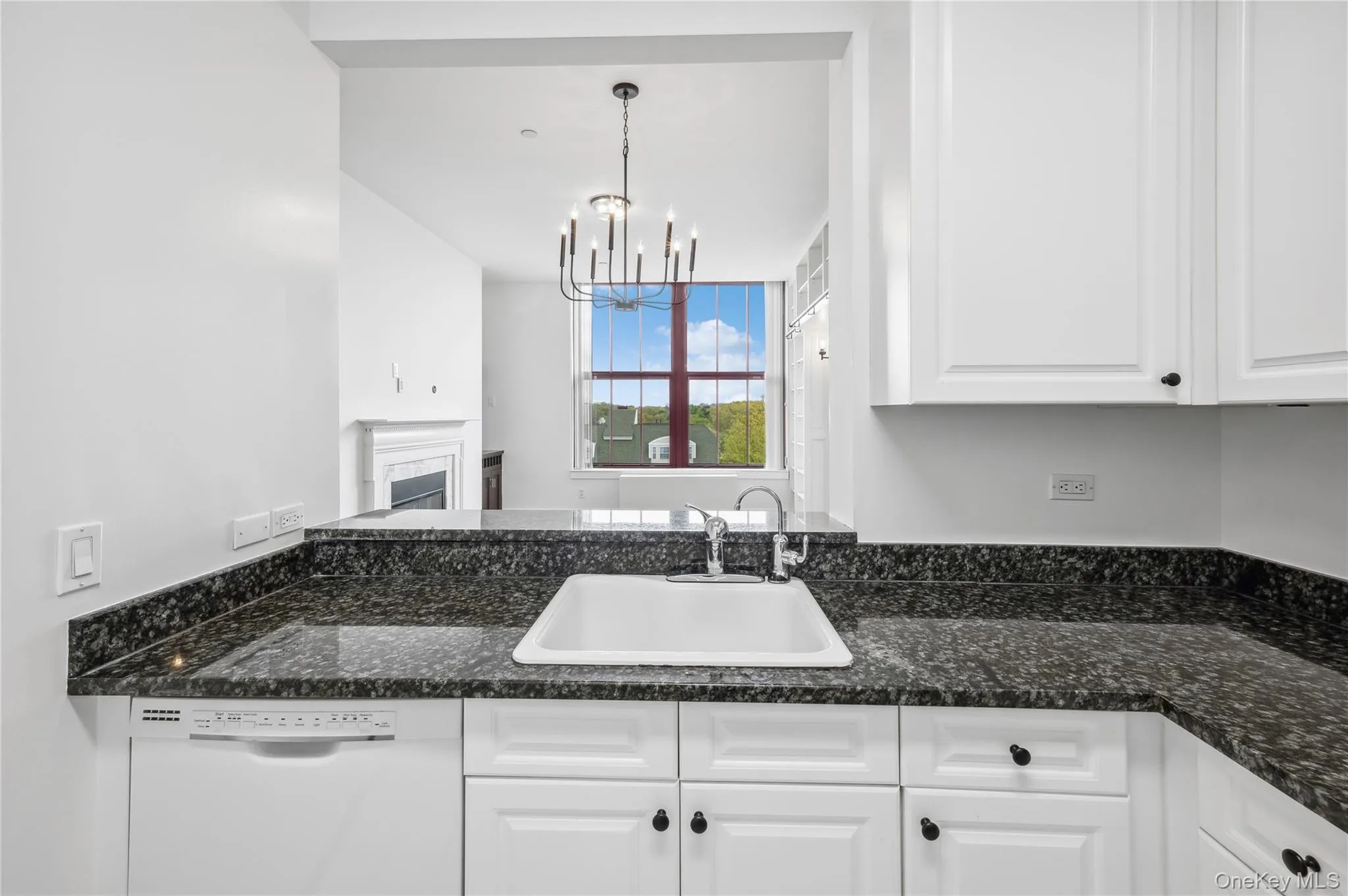 Kitchen with sparkling granite counters. Kitchen with sparkling granite counters.