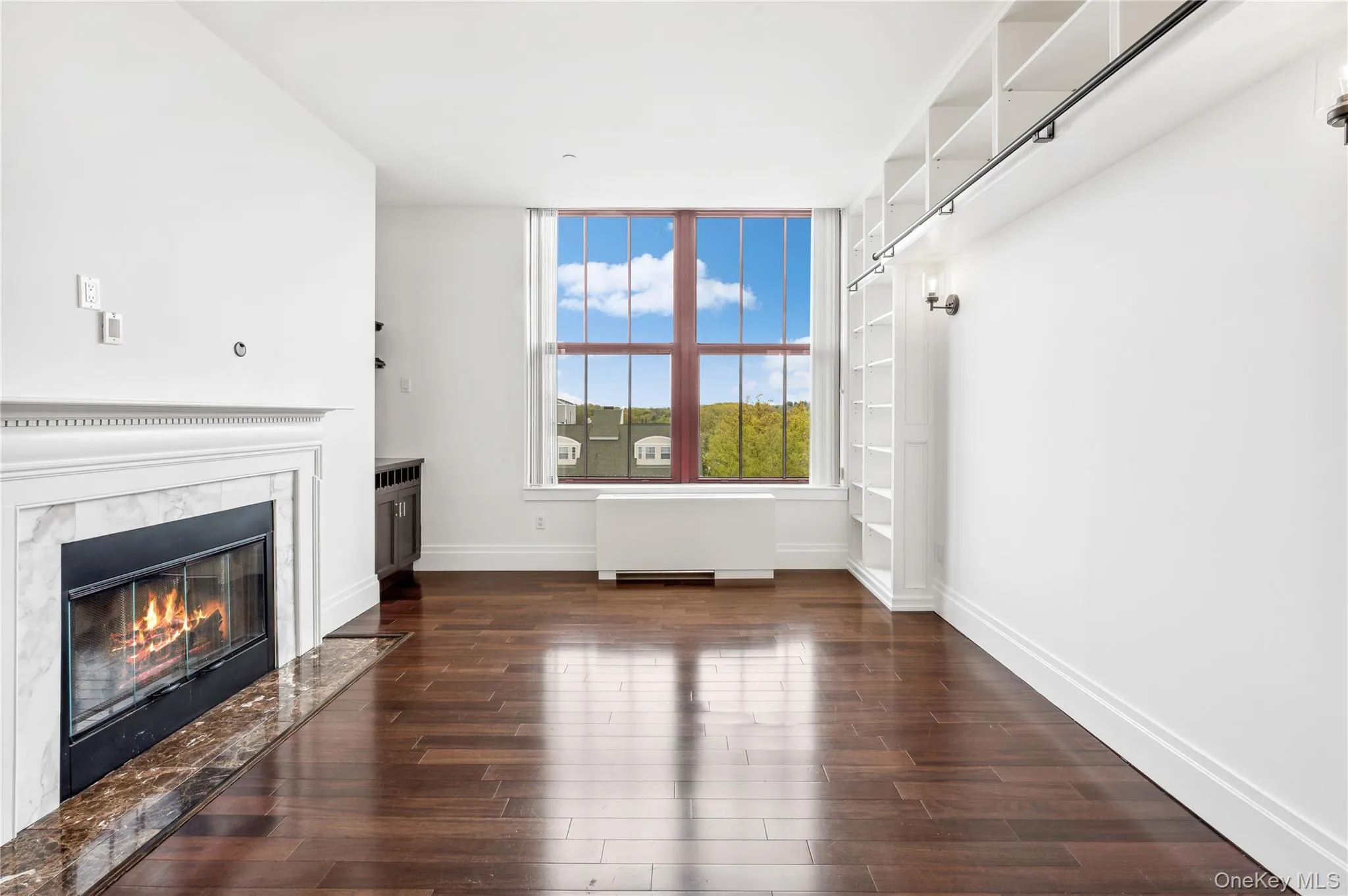 Living room with gas fireplace. Living room with gas fireplace.