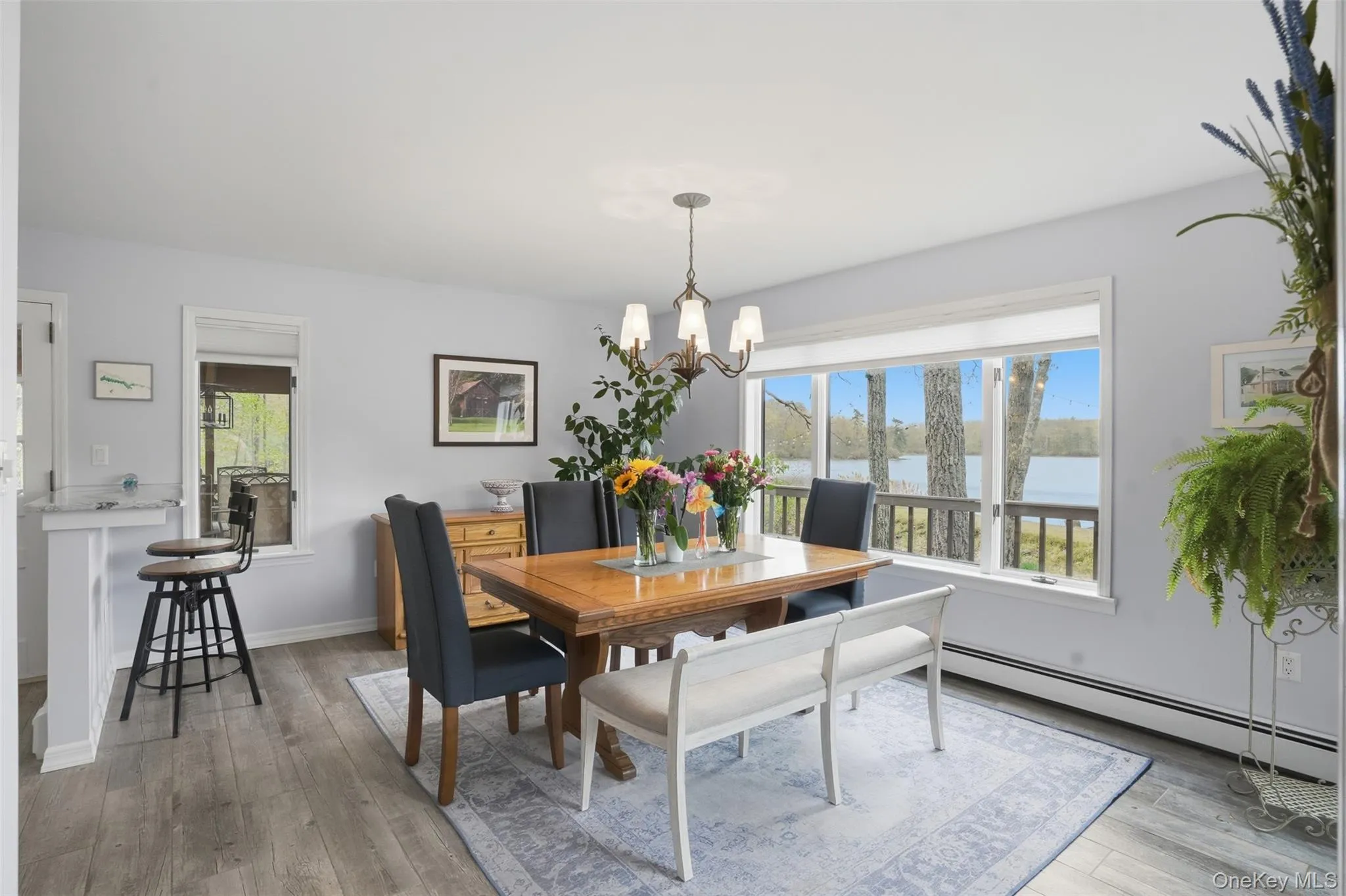 Lovely view. Dining room features breakfast bar. Lovely view. Dining room features breakfast bar.