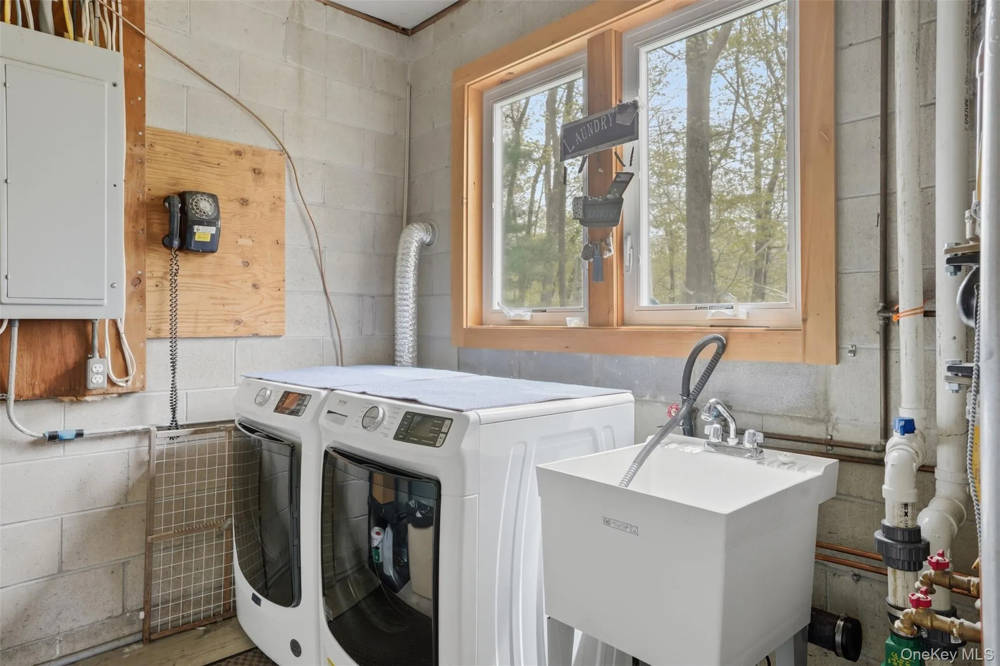 Lower Level. Washer/Dryer slop sink. Utility room. Lower Level. Washer/Dryer slop sink. Utility room.
