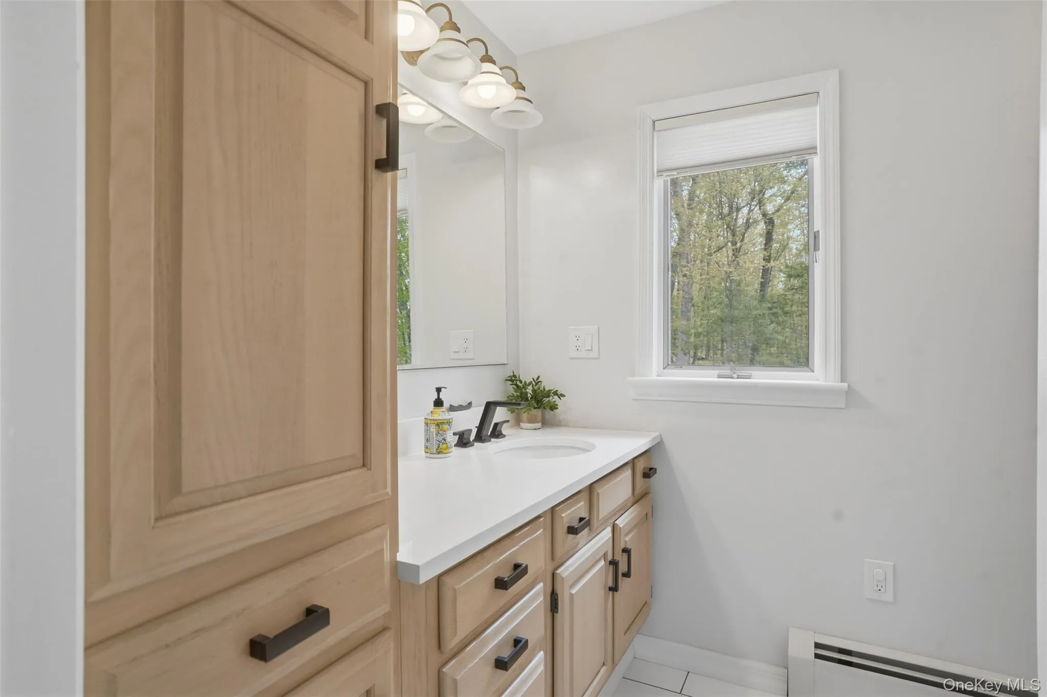 Main floor full bathroom. Wood cabinetry. Granite CT. Walk in tile shower. Main floor full bathroom. Wood cabinetry. Granite CT. Walk in tile shower.