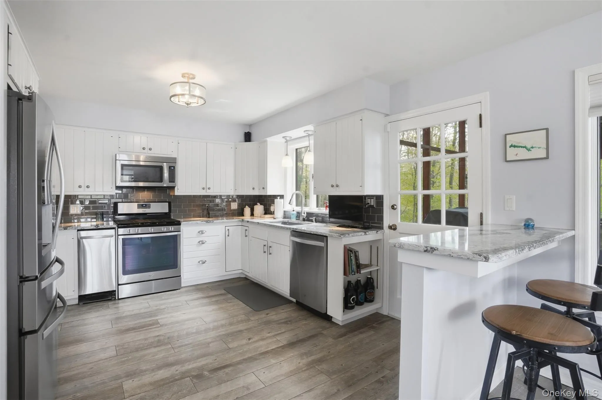 Access to screened in porch for seasonal dining. Access to screened in porch for seasonal dining.