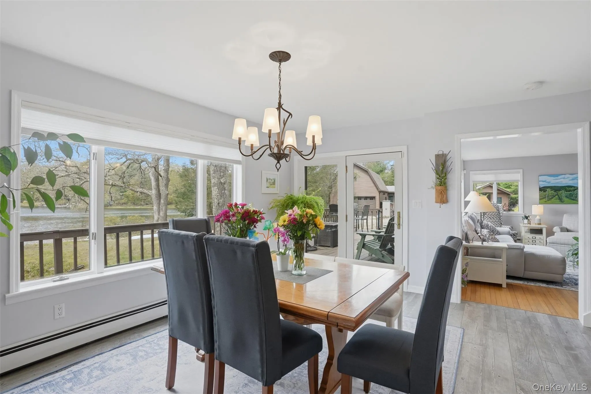 Beautiful windows overlooking pond. Exit/entry to deck. Entertain with ease inside and out! Beautiful windows overlooking pond. Exit/entry to deck. Entertain with ease inside and out!