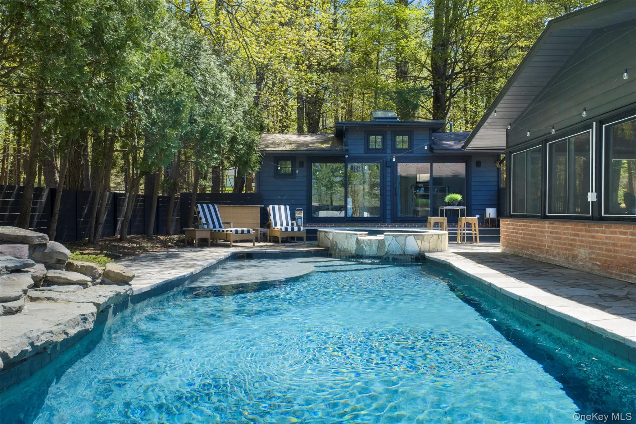 Pool with Guest house beyond Pool with Guest house beyond
