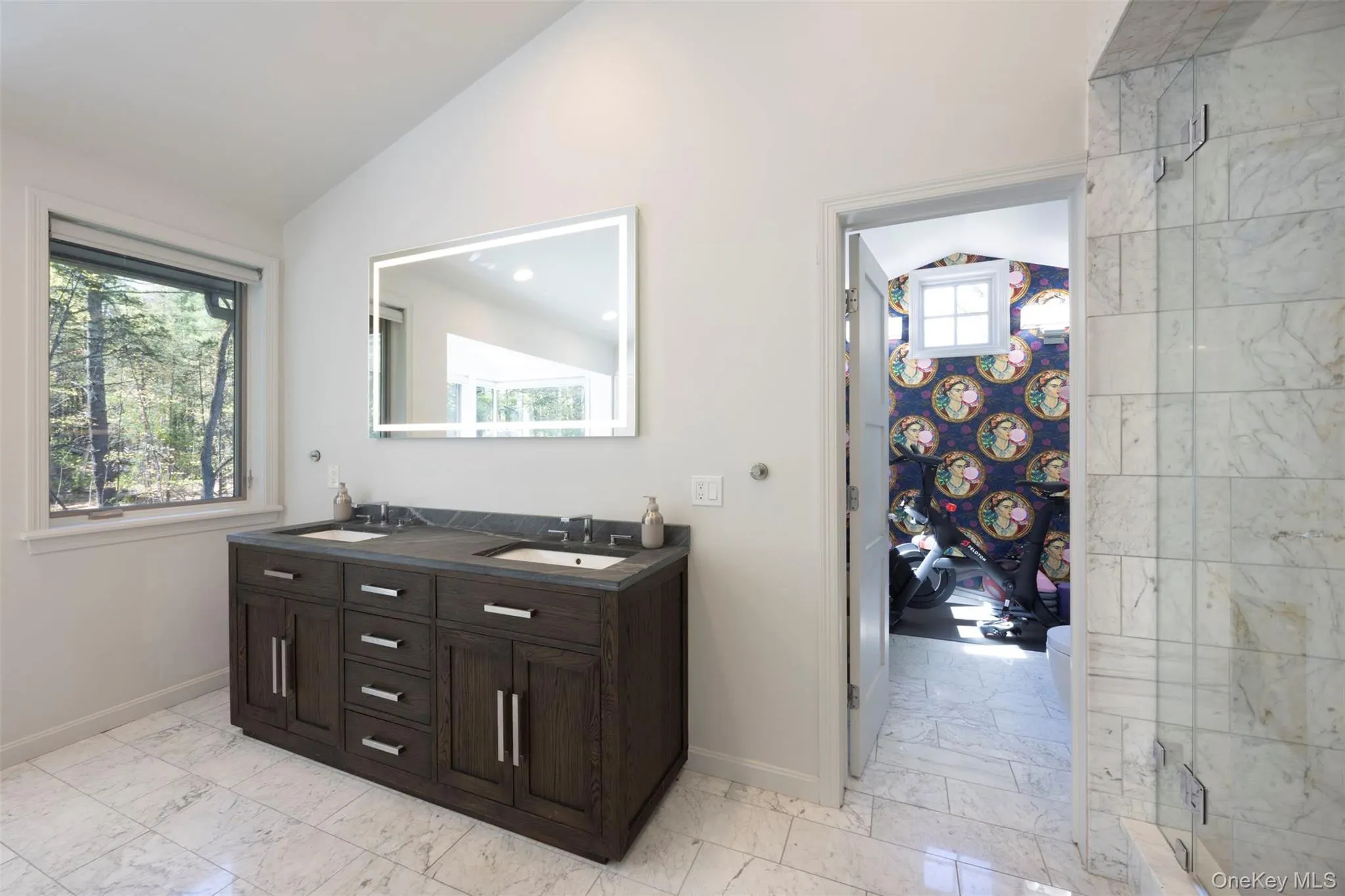 Double vanity with toilet room beyond Double vanity with toilet room beyond