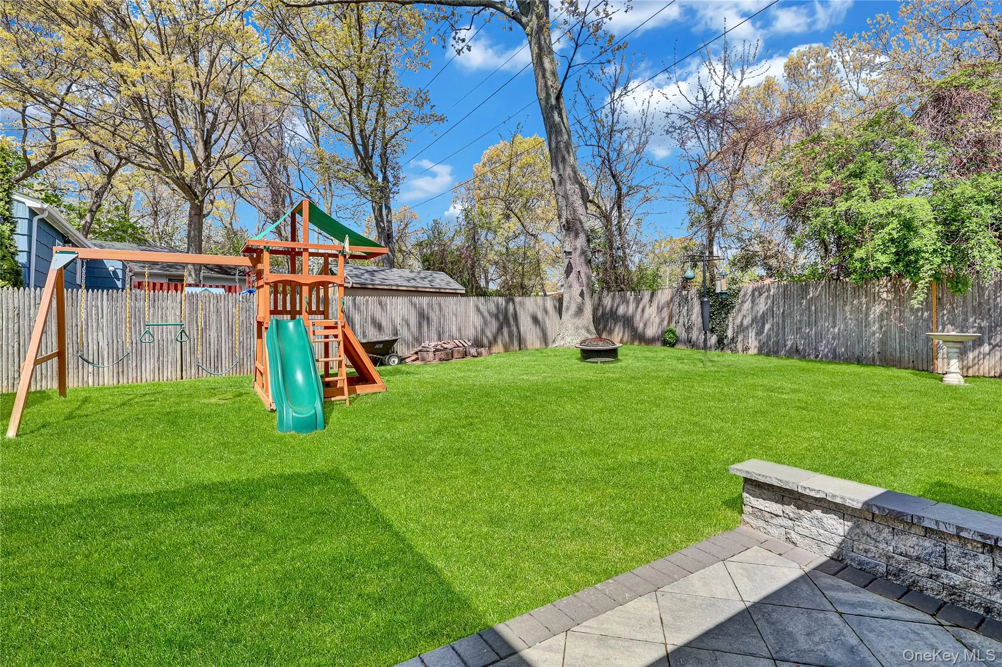 Large yard with swingset Large yard with swingset