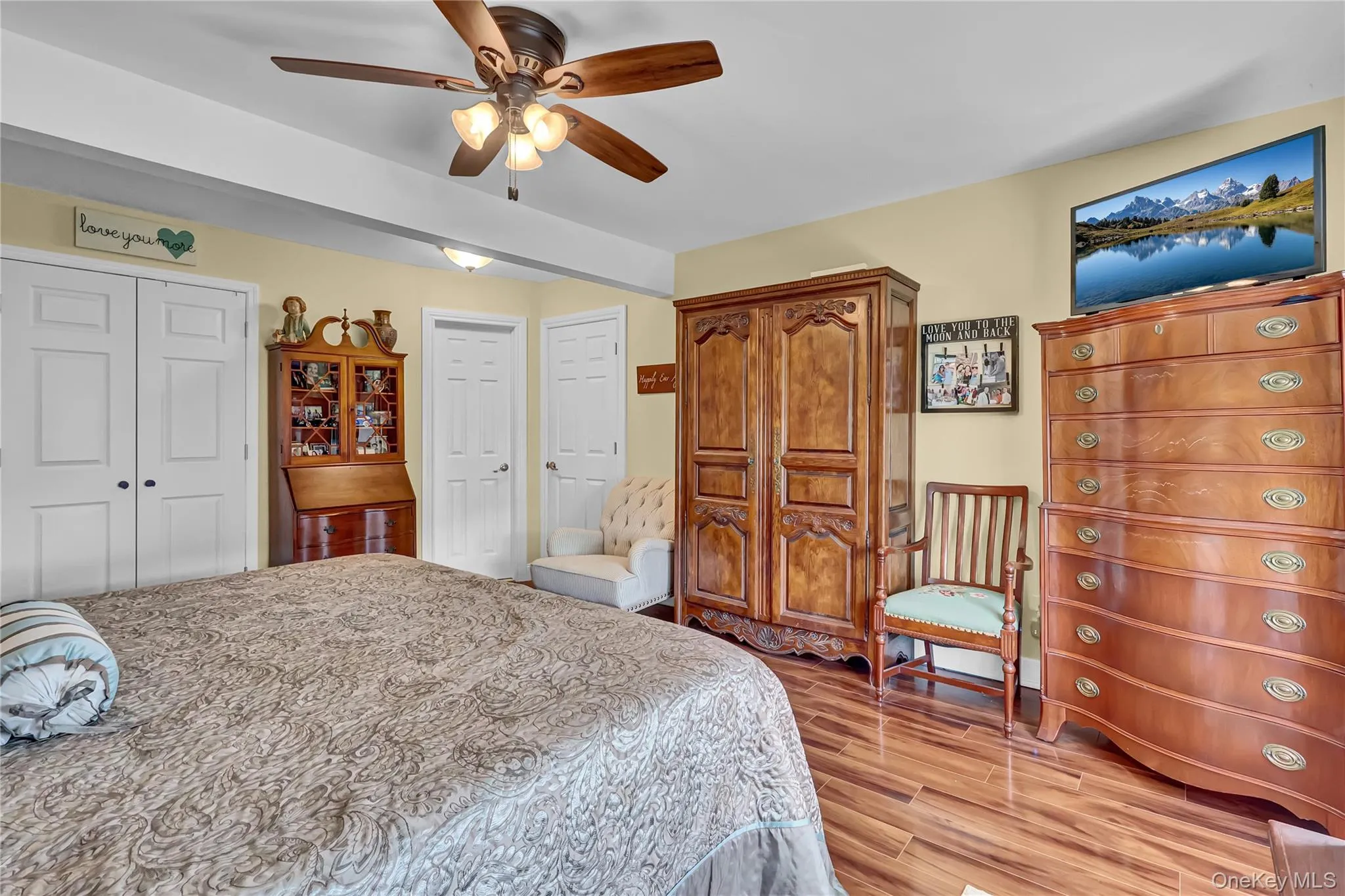 First floor primary bedroom is spacious and offers beautiful hardwood flooring First floor primary bedroom is spacious and offers beautiful hardwood flooring