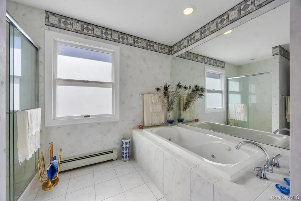 Bathroom with tub and shower Bathroom with tub and shower