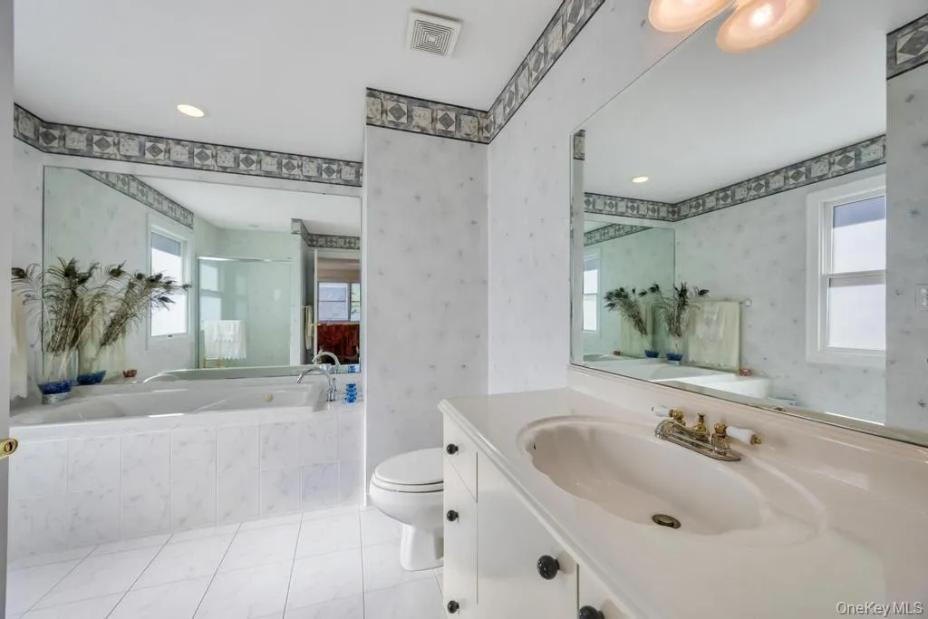 Bathroom with tub and shower Bathroom with tub and shower