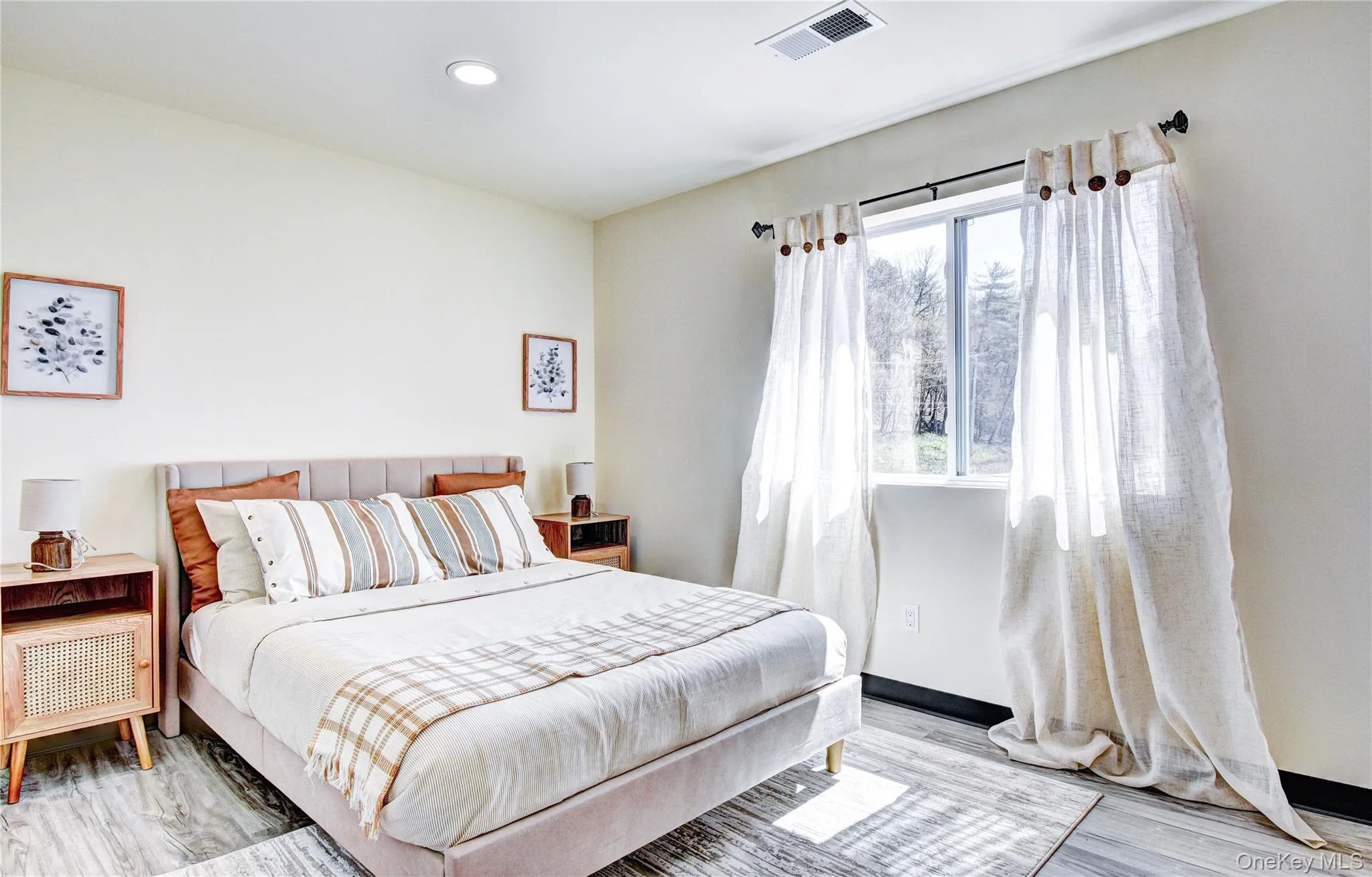 Bedroom with hardwood / wood-style floors Bedroom with hardwood / wood-style floors