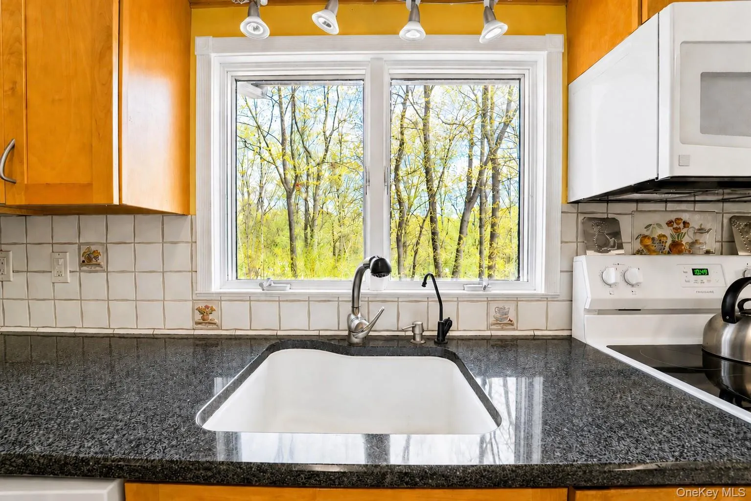 “It’s the little things in life—like doing the dishes while enjoying peaceful views of nature—that make it all so much better. “It’s the little things in life—like doing the dishes while enjoying peaceful views of nature—that make it all so much better.