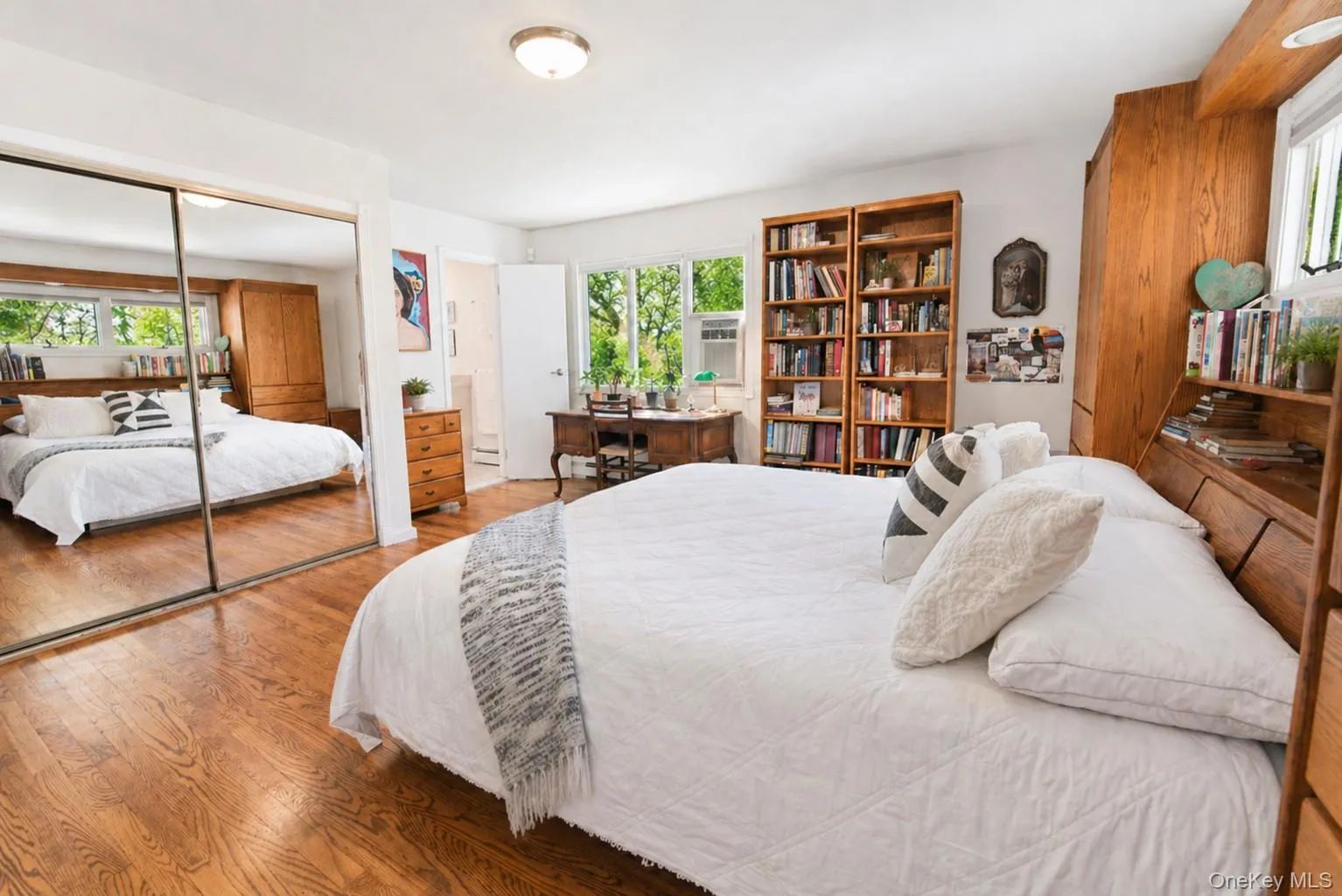 The primary bedroom includes dual double closets, adding excellent storage and functionality. The primary bedroom includes dual double closets, adding excellent storage and functionality.