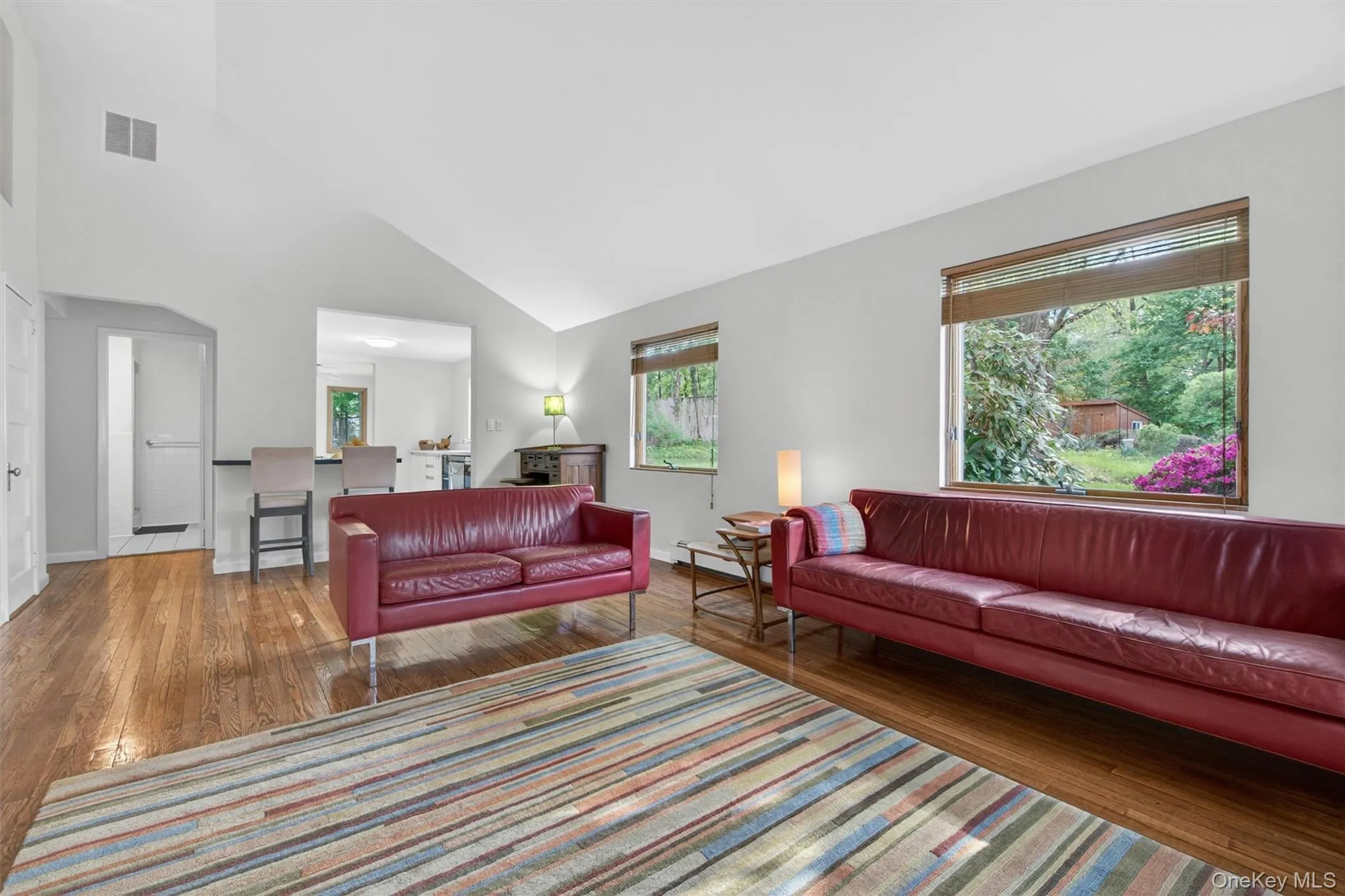 Large windows grace the living room. Large windows grace the living room.