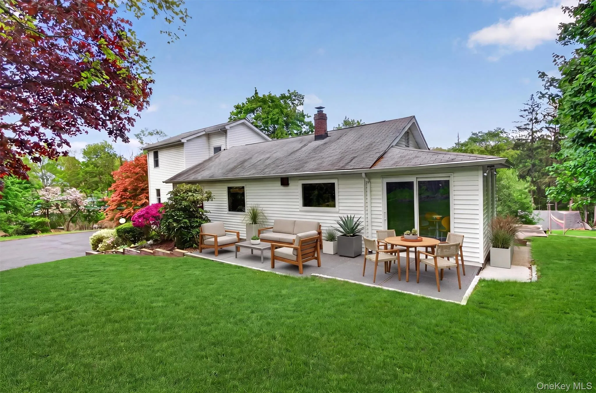 Entertain or enjoy a quiet morning coffee on the patio. Virtually staged. Entertain or enjoy a quiet morning coffee on the patio. Virtually staged.